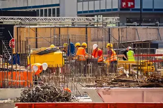 Welded steel reinforcement mesh laid out on a construction site.